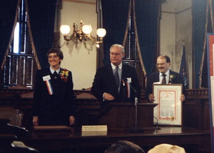 This photo shows Senator Schwartz at the Capitol’s 1992 rededication with Kerry Chartkoff (left) and Jerry Lawler (right).