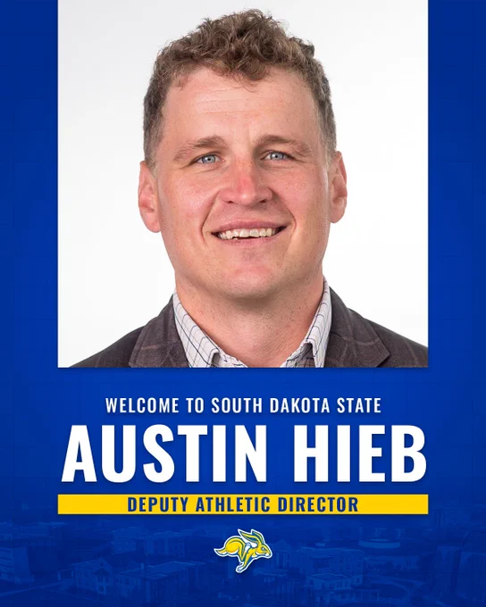 Graphic announcing the hiring of Austin Hieb as Deputy Athletic Director at South Dakota State. Graphic features a centered portrait photo of a person on a light background. The lower half of the graphic has a blue design with a faded aerial campus view. Large white and yellow text reads “WELCOME TO SOUTH DAKOTA STATE” and “AUSTIN HIEB” with “DEPUTY ATHLETIC DIRECTOR” in a yellow bar beneath the name.