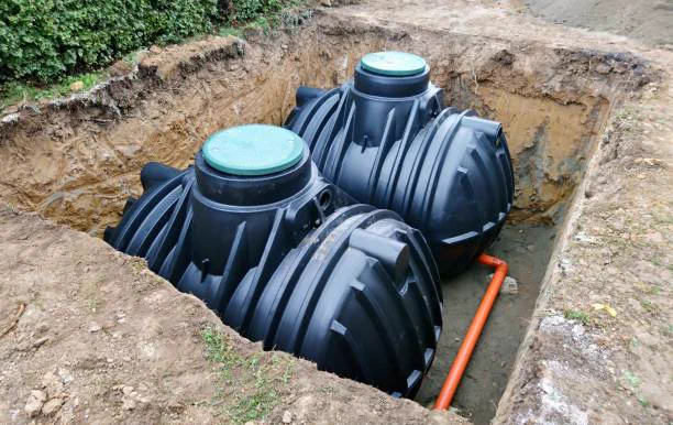 Two plastic underground water containers