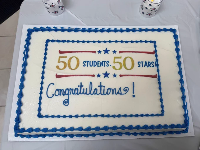 Frosted cake celebrating 50 Students, 50 Stars