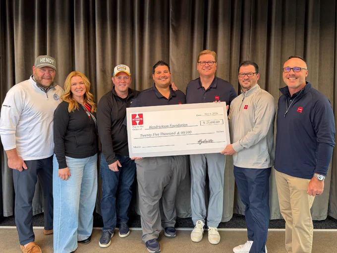 Group of Hendrickson Foundation employees and Hydrite employees presenting a check for $25,000