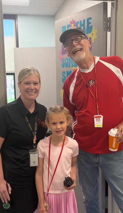Olivia with Principals Toth and Hartland