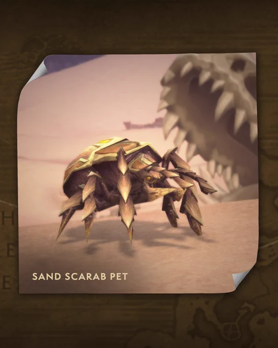 To the bottom left, the image says, \u201CSand Scarab Pet\u201D - a six-legged insect in bronze tones. This photo was taken with the pet in the desert, with a large skull in the background to the right, with the skull\u2019s mandible hiding behind the sand dune. The photo has curled edges, showing that the background below the photo is brown, with hints of the world map.