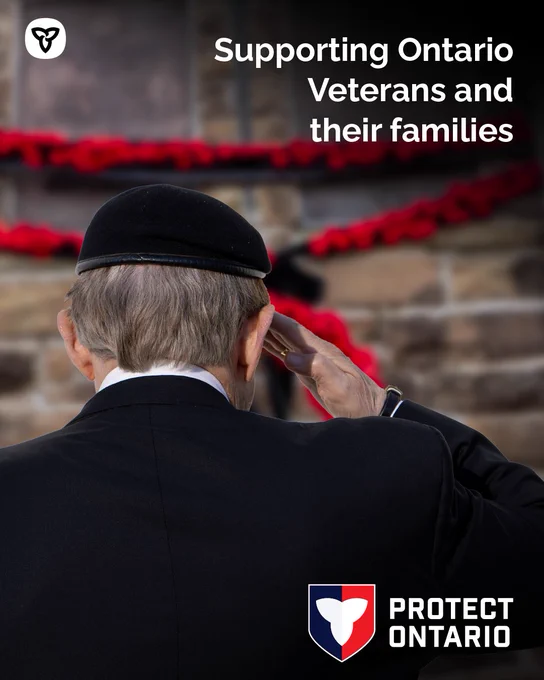 Back of older Veteran in black beret 