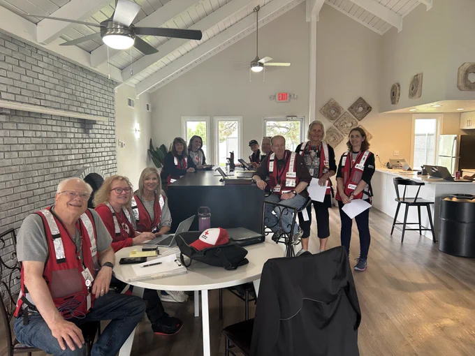 Red Cross volunteers in a common space