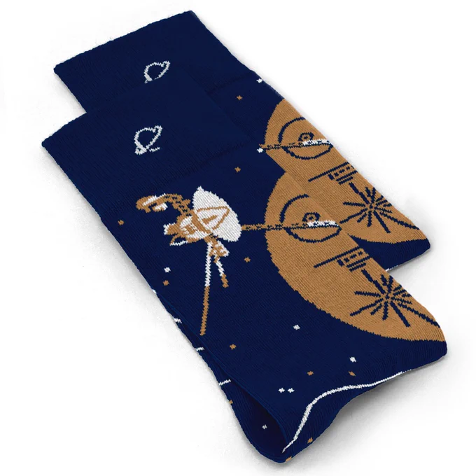 Socks inspired by the Voyager mission. Left shows the Voyager Golden Record disc, right shows the Voyager spacecraft. Socks are blue, brown/gold and white.