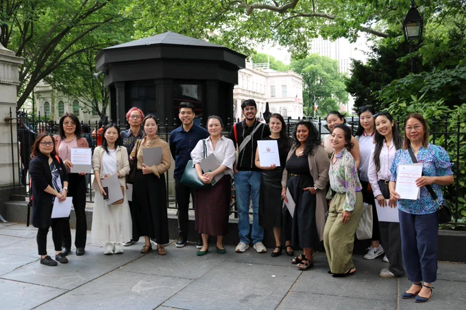 A group photograph of Rapid Immigration Support & Empowerment Network members 