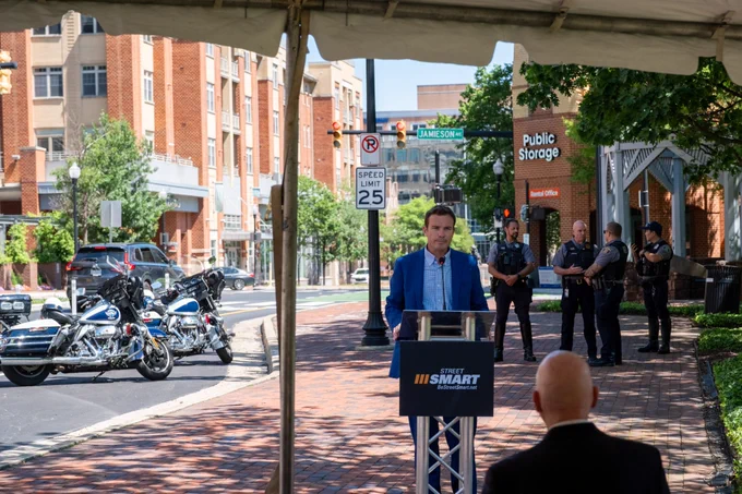 COG Executive Director Clark Mercer delivers opening remarks at the Spring 2026 launch event for COG’s Street Smart campaign, which was held in front of the newly restored streetscape on Holland Lane in Alexandria.