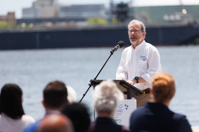 Photo of Chris Rowsom speaking at the event.