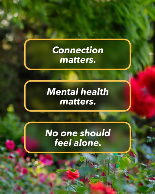 A garden scene with vibrant red flowers and green foliage. Overlaid text reads: "Connection matters. Mental health matters. No one should feel alone.