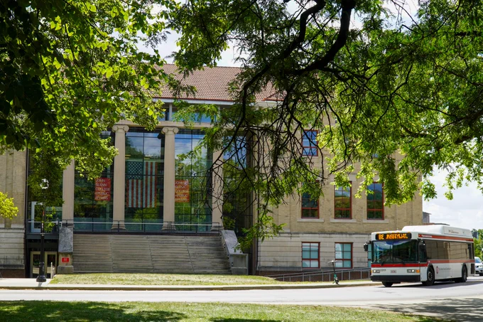 Page Hall on Ohio State's campus, a campus bus is starting to pass