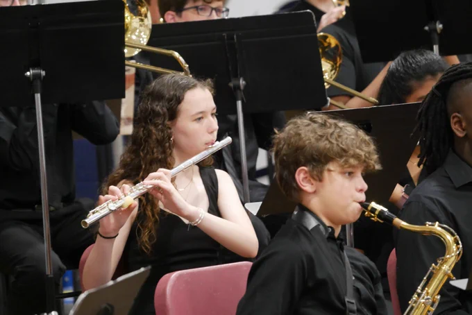 A member of the Francis Howell Central jazz band plays the flute during the Jazz Central Concert at FHC