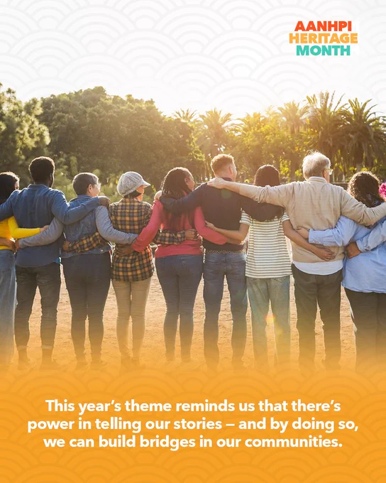 AANHPI
HERITAGE 
MONTH
This year's theme reminds us that there's power in telling our stories-and by doing so, we can build bridges in our communities. 

Photo description:
A large group of people stand close together with their backs to the camera, arms wrapped around one another’s shoulders as they face a view of tropical trees on a college campus. The scene captures a sense of community and connection in a peaceful, outdoor setting.