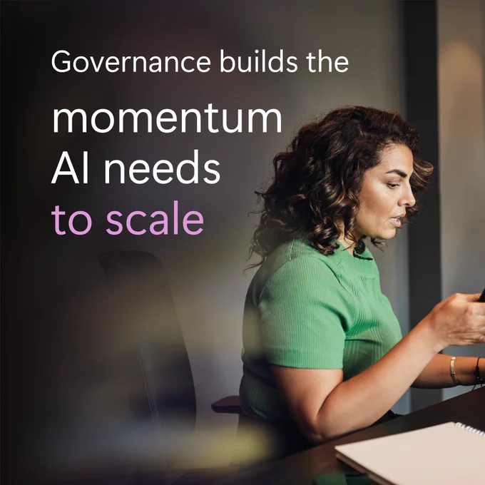 A person in a green shirt sits at a desk with a notebook, accompanied by text reading "Governance builds the momentum AI needs to scale".