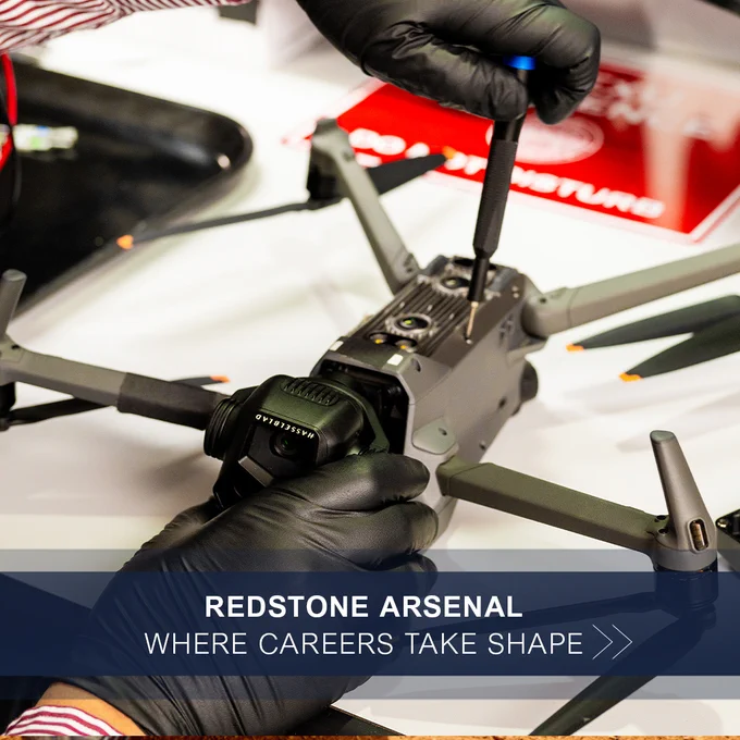 Man wearing gloves and using a screwdriver to work on a drone. Redstone Arsenal. Where Careers Take Shape. FBI Jobs logo.