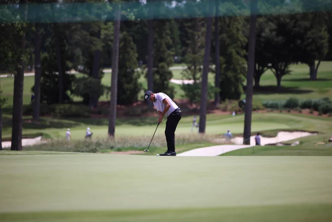 Korn Ferry Tour pro golfers in action at the UNC Health Championship at the Raleigh Country Club.