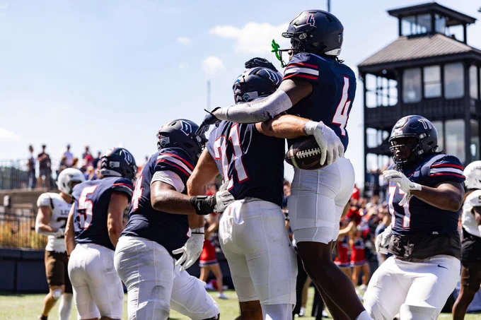 Tarabrella celebrating with teammates