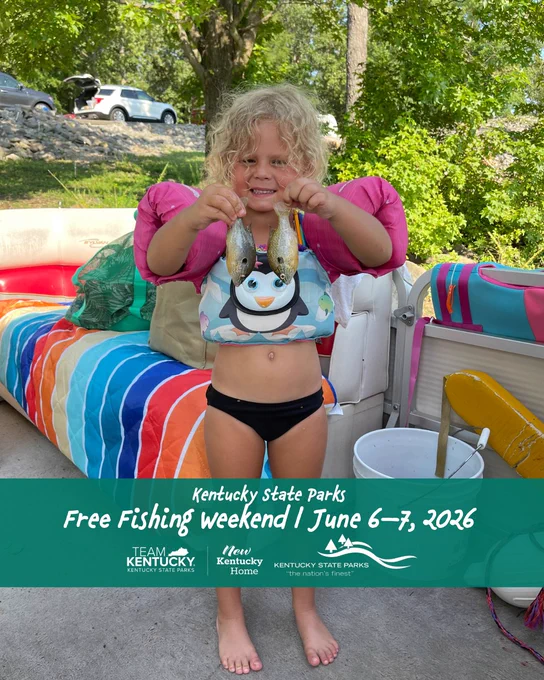 A child with curly hair stands on a colorful boat deck, holding two small fish. The child is wearing an inflatable penguin-themed floatie. A banner at the bottom reads: "Kentucky State Parks Free Fishing Weekend | June 6-7, 2026." Logos for Team Kentucky, Kentucky Home, and Kentucky State Parks are visible.