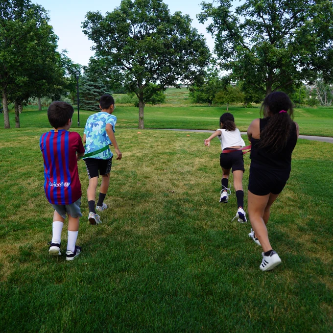 Four athletes work out during the summer in our Youth Athletic Conditioning class.