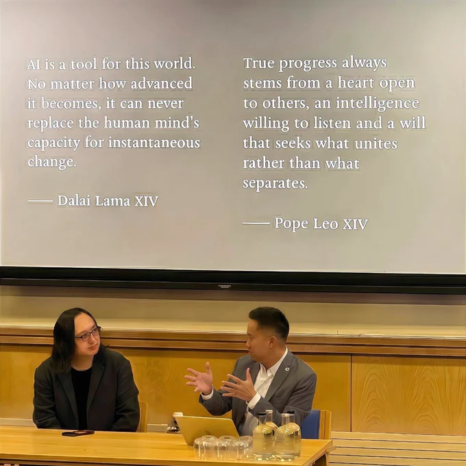 Audrey Tang (left), Taiwan’s cyber ambassador, first digital minister, architect of the Taiwan Model for digital diplomacy and 2025 Right Livelihood laureate, listens as Dr Bo-Jiun Jing (right), senior research fellow and programme manager in Taiwan Studies at the Oxford School of Global and Area Studies, discusses AI-related words of wisdom from His Holiness the Dalai Lama and Pope Leo XIV during the Outrage to Overlap: Civic AI and 6-Pack of Care talk at the Nissan Institute of Japanese Studies, St. Antony's College, University of Oxford, in the U.K.