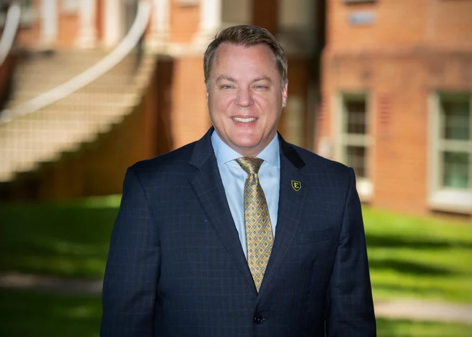 Dr. Rob Pack standing in front of Lamb Hall.