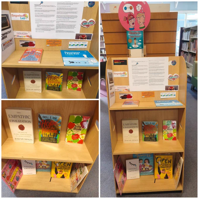A vibrant assortment of books and library items about empathy showcased on shelves
