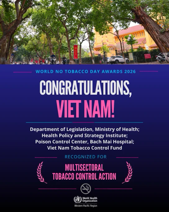 Tree-lined street with motorbikes and cars passing a yellow building under a green canopy of trees. Below, text reads World No Tobacco Day Awards 2026. Congratulations, Viet Nam! Department of Legislation, Ministry of Health; Health Policy and Strategy Institute; Poison Control Center, Bach Mai Hospital; Viet Nam Tobacco Control Fund recognized for multisectoral tobacco control action. At the bottom is the World Health Organization (WHO) Western Pacific Region logo.
