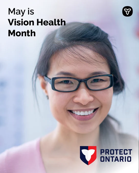A smiling woman wearing glasses