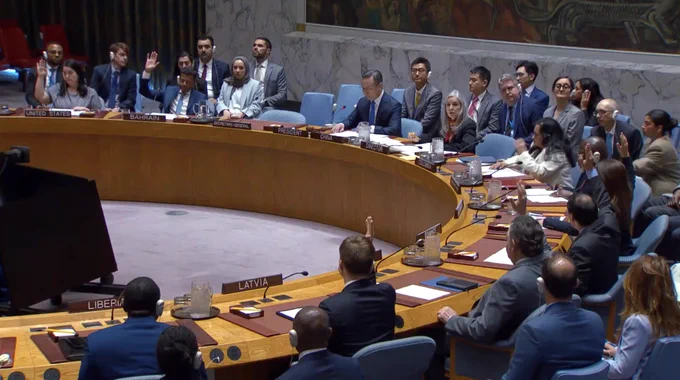 Security Council members vote on the draft resolution.