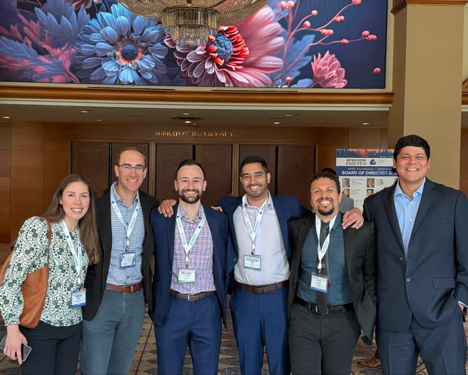Two Pediatric Surgery faculty and four general surgery residents stand together for a picture