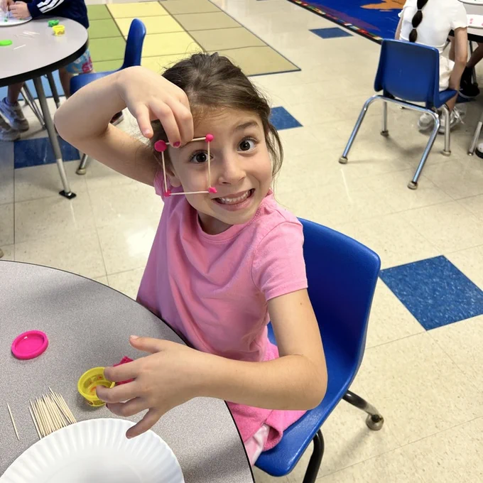 KRO uses play-doh & toothpicks to build 3D shapes.