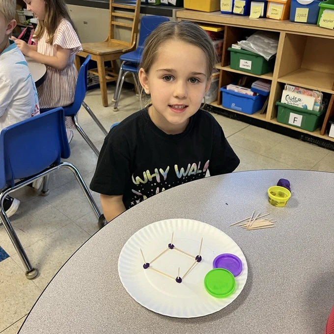 KRO uses play-doh & toothpicks to build 3D shapes.