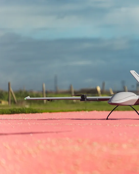 Take a good, long look. This is what mission efficiency looks like.

Length? 1450mm.

Wingspan? 3000mm.

Height? 630 mm.

The numbers don’t do it justice. You must see it in action to truly understand the power the BVT516 (VTOne) AI-Powered Class 3 VTOL Fixed-Wing brings to every mission.

This hybrid UAV combines the features of a quadcopter and a fixed-wing aircraft: vertical take-off and landing mode, perfect for tighter spaces and complex landing conditions, as well as forward flight mode, to cover more ground and reach higher speeds.

A Beyond Vision original.