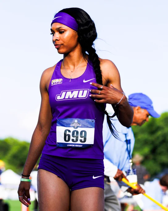 Bria Byrd looking at her long jump mark.