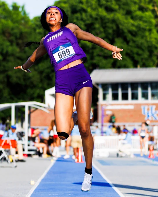 Byrd launching herself into the sand pit.