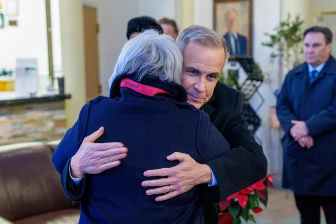 Prime Minister Mark Carney and Her Excellency the Right Honourable Mary Simon embrace at the Tumbler Ridge vigil.