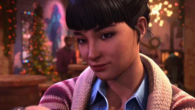 An ultra-close-up cinematic portrait of Amanda Thomas from Life is Strange: Double Exposure, an Indigenous woman of Cherokee and Algonquin descent. Amanda is looking directly forward with a soft, affectionate, and tender expression, a gentle and knowing smile playing on her lips. Her dark hair is styled in space buns with her blunt bangs framing her face. She wears a blue denim shirt under a striped knit cardigan. The background shows the warm, cozy interior of her bar, The Snapping Turtle, located in Lakeport, Vermont, beautifully blurred with festive holiday lights and a decorated Christmas tree.