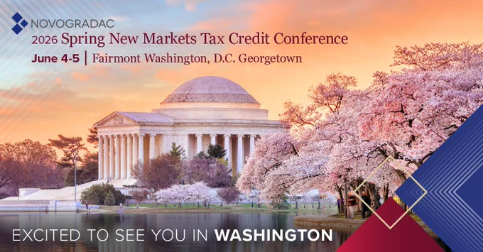 Cherry blossoms in full bloom near the Thomas Jefferson Memorial at sunset in Washington, D.C., promoting the 2026 Spring New Markets Tax Credit Conference.