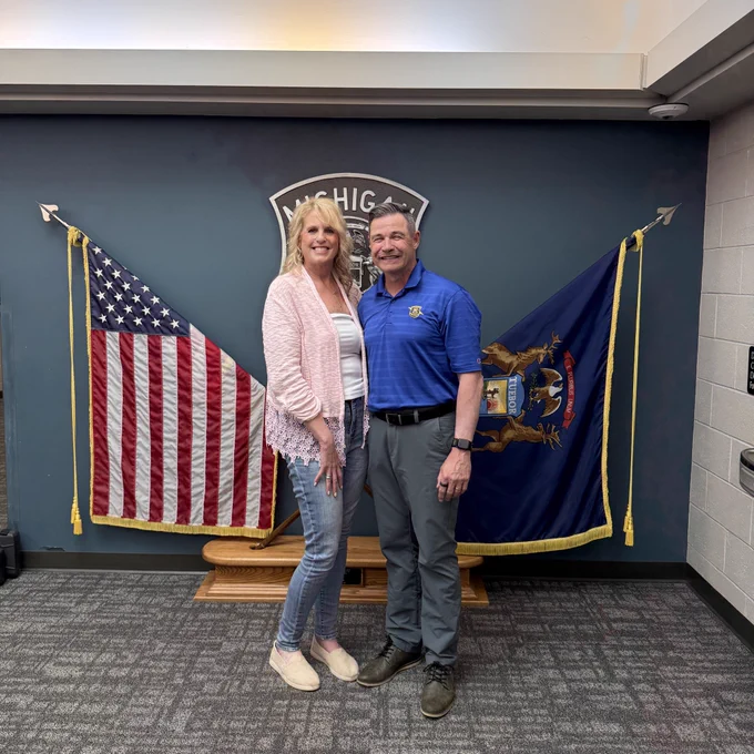 F/Lt Mike Shaw and his wife at his retirement sign out