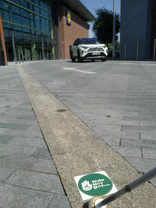 Photo (above) showing shared space area at Lidl Castleknock where footpath is at the same level as the road.
