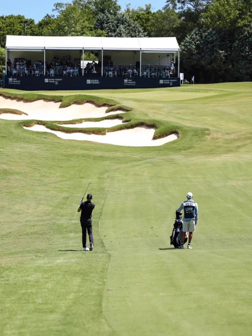 Day 2 action from the UNC Health Championship. Golfers tee off from the course, hit shots from the fairway and line up putts on the green as spectators watch throughout the tournament.