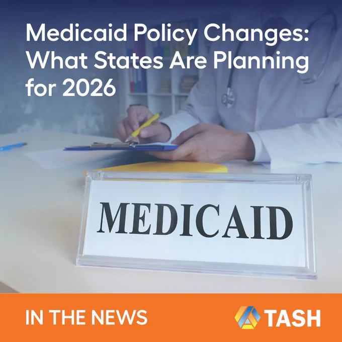 Medicaid policy changes for 2026 headline with a "MEDICAID" desk sign in front of a doctor writing on a clipboard.