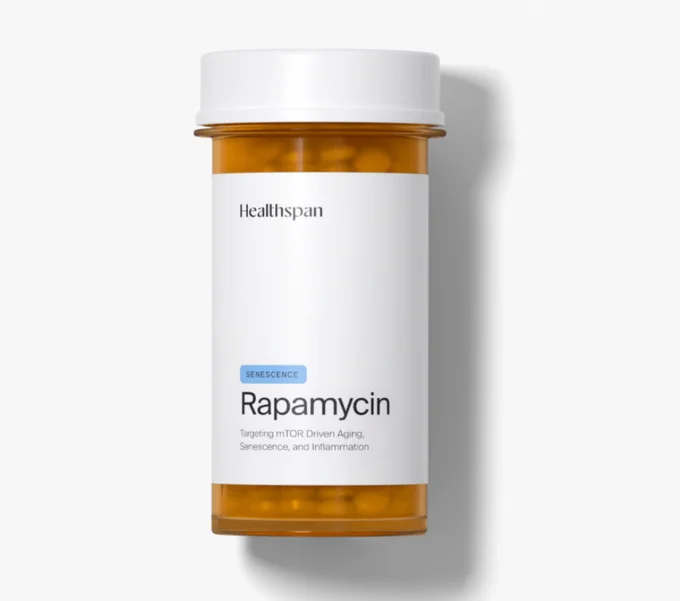 An orange prescription pill bottle with a white cap reads “Rapamycin—targeting mTOR -driven aging, senescence and inflammation.” The image is AI-generated to list the drug’s benefits specifically.