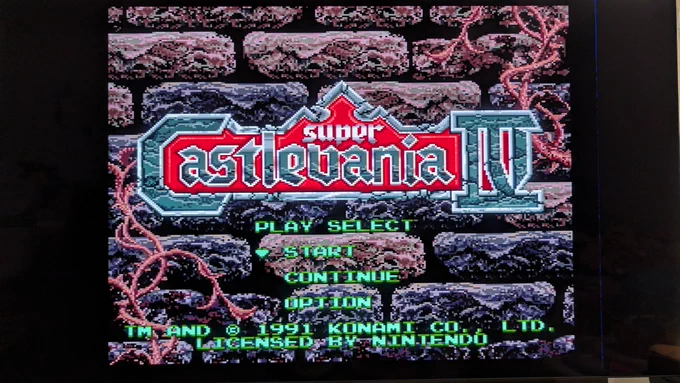 Super Castlevania IV title screen displayed on a Sony PVM via S-video from the recapped Super Famicom Jr., with the Dracula's castle title artwork.