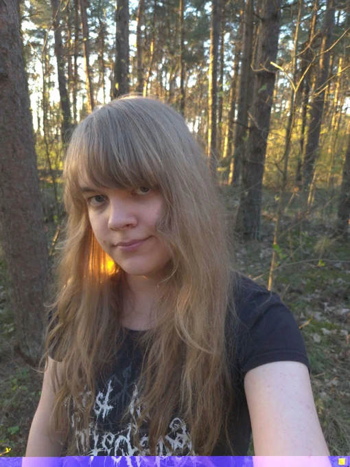 portrait/selfie of me standing in a forest