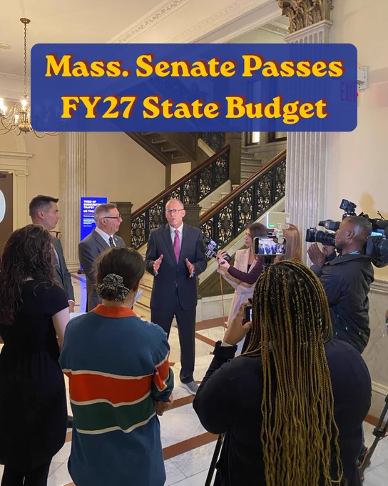 Photo of Senator Lewis speaking with the press about the budget with the text, “Mass. Senate Passes FY27 State Budget.”
