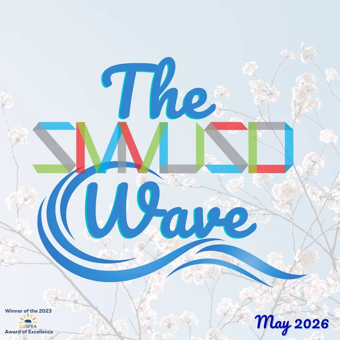 The Mid Wave logo with colorful geometric letters and blue wave design over a soft floral background, dated May 2026.