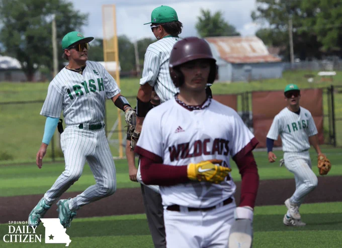 Springfield Catholic teammates celebrate after winning their quarterfinal matchup with the mercy rule, 12-0 after 5 innings. (Photo by Ellie Frysztak)
