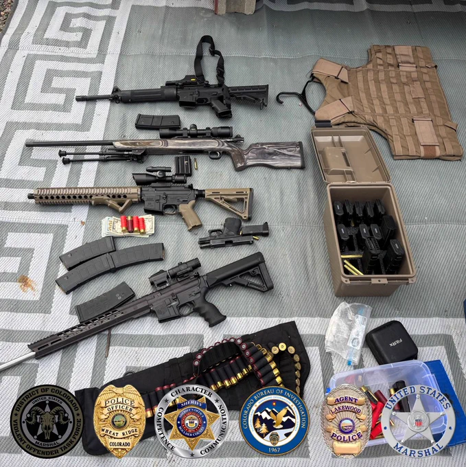 Weapons seized during the execution of a search warrant after the arrest of fugitive Shane JACKSON.
