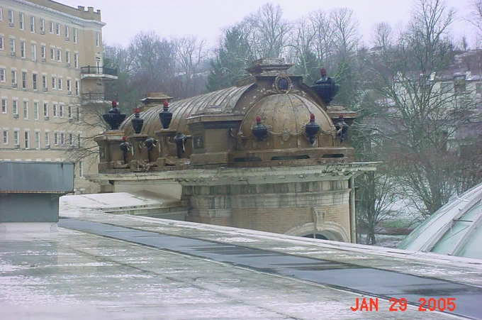 Rooftop view of French Lick Springs Hotel in winter, showing an ornate, domed structure with trees in the background. The date on the image is January 29, 2005.